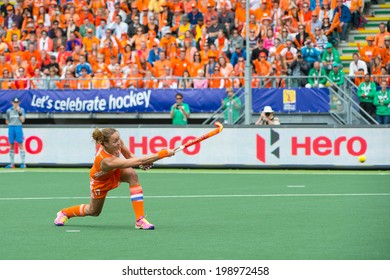 THE HAGUE, NETHERLANDS - JUNE14: Captain Maartje Paumen of the Dutch womens field hockey team scores 1-0 against Australia during the finals of the Rabobank Hockey World Cup. in 2014
