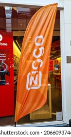 The Hague, The Netherlands - October 8 2021: Dutch Telecommunications Company Ziggo Name Banner Flag In Front Store, Merge With Vodafone Offering Cable TV, Internet And Telephony Services In Holland 