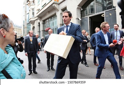 The Hague, The Netherlands - September 17, 2019: Minister of Finance Wopke Hoekstra holding the briefcase with the government budget during Prinsjesdag, opening of the parliamentary year in Holland