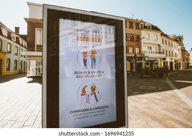 Haguenau France - April 1 2020: View On City Advertising Board OOH Digital Display Of Information From French Government During Covid-19 Pandemic Coronavirus Lockdown - Empty Street Background -