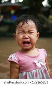 HAI DUONG, VIETNAM - SEPT 24: Unidentified Child Crying At The Camera Of Visitor At A Playground On September 24, 2009. She Was Afraid Of Strange People.