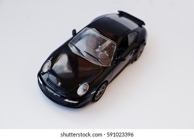 Hai, Ukraine - March 1, 2017: Mini Copy Of Toy Car Porsche GT2 Isolated On White Background.