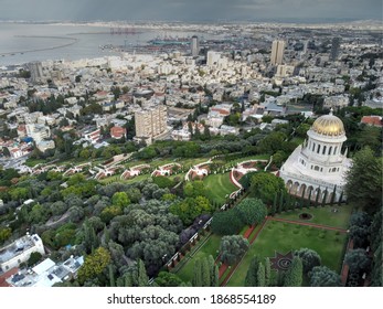 Haifa. Israel - December 6 2020: Shrine Of The Báb, Gardens And The Bay Of Haifa In The Background  