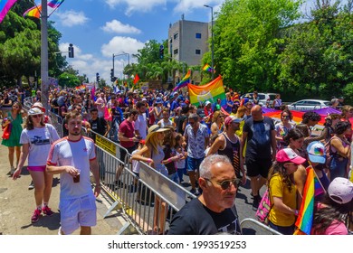 Haifa, Israel - June 18, 2021: A Crowd Of People March In The Street At The Annual LGBTQ Pride Parade In Haifa, Israel. Post Covid-19 Celebration