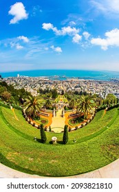 HAIFA, ISRAEL - MAY 6, 2017: Bahai World Center. Pilgrimage center and popular tourist destination. Sunny day by Mediterranean Sea. View from Mount Carmel to the seaport of Haifa. 