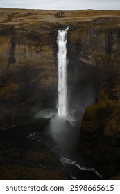 Haifoss Waterfall Cascading Down Cliffs in Iceland