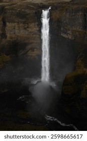 Haifoss Waterfall Cascading Down Cliffs in Iceland
