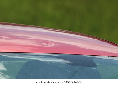 Hail Damage At Car, Red Colored Car