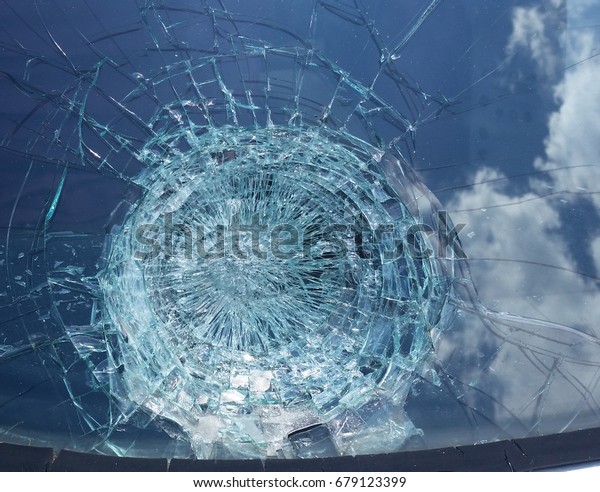 Hail damage windshield\
sky damage blue