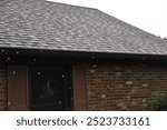 hail, hailstorm hitting roof tiles during a thunderstorm, rainstorm, brick wall and window