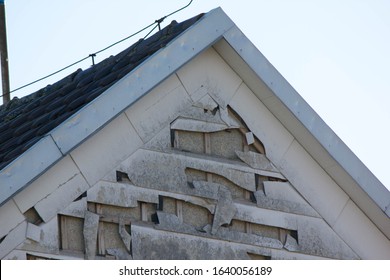 Hail And Storm Damage At House Wall, Stormy Weather, Holes In Exterior Siding In Home From Damage By Hail Storm , Climate Change, Danger