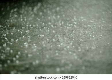 Hailstone dropping on concrete floor