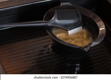 Hair Beauty. Close Up Of A Mixture For Spa Treatments. Comb