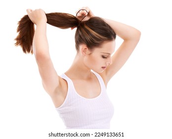 Hair, beauty and mockup with a woman in studio isolated on a white background for natural or keratin treatment. Haircare, cosmetics and tying with a young female posing to promote her hairstyle - Powered by Shutterstock