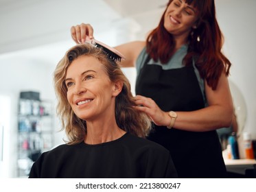 Hair care, brush and hairdresser with senior customer for hair maintenance, hair salon service or beauty studio spa treatment. Happy, smile and designer hairstyle for client with beautician stylist - Powered by Shutterstock