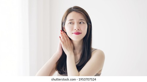 Hair Care Concept Of Young Asian Woman.