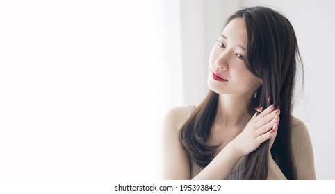 Hair care concept of young asian woman.