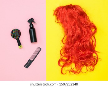 Hair care products and a bright orange wig on a two-tone background. Lifestyle. Accessories to create style. - Powered by Shutterstock