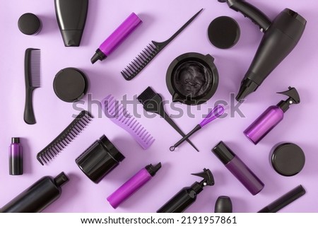 Hair care, styling and coloring products with hair dye hairdressing tools. Top view, flat lay