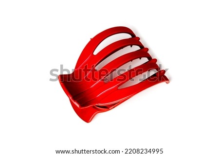 A hair clip for fixing the hair. stylish hair claw. a set of pins for beauty and fashionable hair accessories.in the common people - a crab.pin.on an isolated white background.close-up.space for text