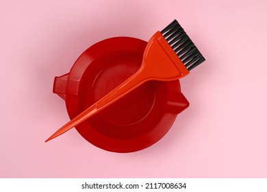 Hair Coloring Tools - Plastic Dye Bowl And Brushes On Pink Background