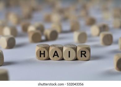 hair - cube with letters, sign with wooden cubes