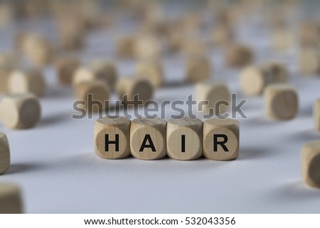 hair - cube with letters, sign with wooden cubes