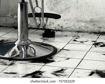 Hair Cut Off On Floor In Barber Shop