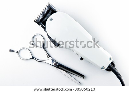 hair cutting scissors and hair clippers for hairdressers.