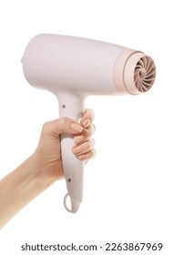 hair dryer in a female hand on a white isolated background