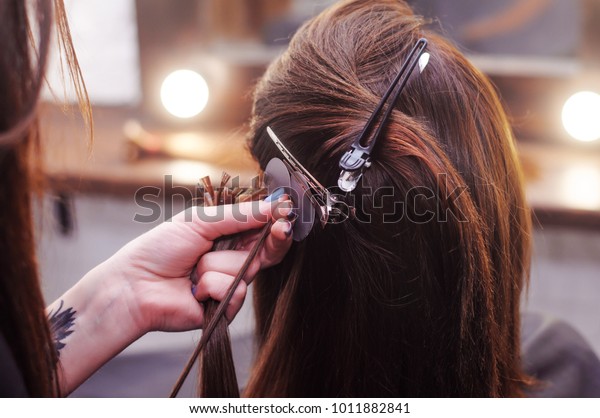 hair extension in\
a professional hairdresser