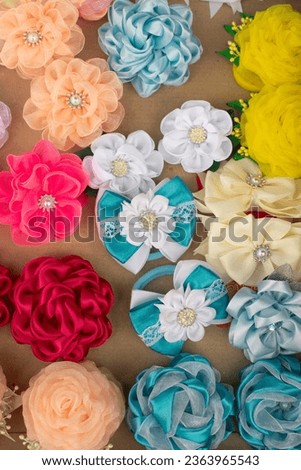 Hair pins. Hair bands. Bows to decorate hairstyle. Flowers made of fabric.