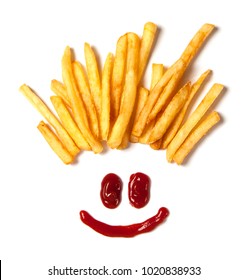 Hair from potatoes. French fries  and a face with a smile from ketchup isolated on white background