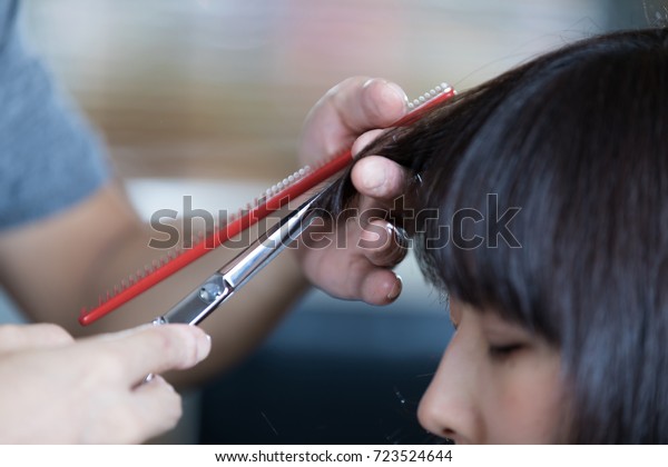 hair salon concept. Fringe\
trim.