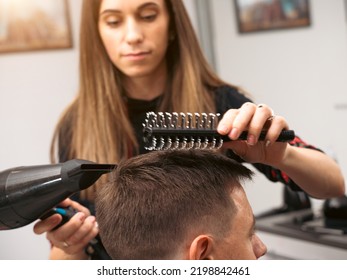 Hair Salon Master Blow Dry Hair Client At Barber Shop. Male Client Getting Haircut By Hairdresser. Hair Care, Beauty Industry, Barber Concept.