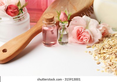 Hair Spa Setting Fresh Flowers Rose Water Oat Flakes Cosmetic Jars Domestic Care Treatment, Delicate Pink Tones, Empty Space Soft Focus. 