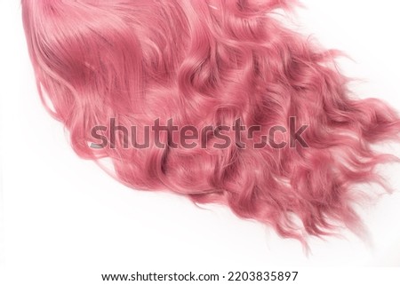 A hair texture of rose pink closeups, a wavy shiny texture, isolated on white