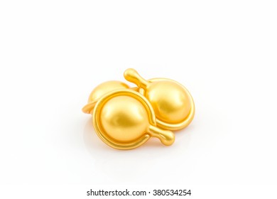 Hair Vitamin Serum Capsule Gold Color On White Background. 