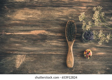 Haircare Concept. Natural Sandalwood Comb Closeup On Wood Background