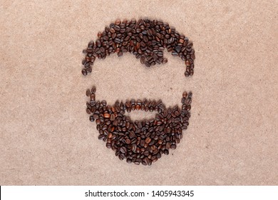 Haircut and beard forming a man face made of roasted coffee beans as representation of barbershop aligned in center on plywood surface - Powered by Shutterstock