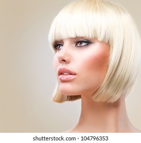 Haircut. Hairstyle. Beautiful Model with short Blond hair