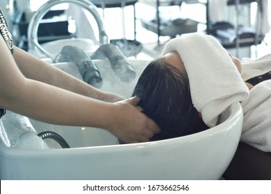 Hairdresser In Beauty Salon Massage Head Customer And Hair Care In Procedure Of Steaming Water Steam. Service Steaming Ozone In Spa And Salon Shop.