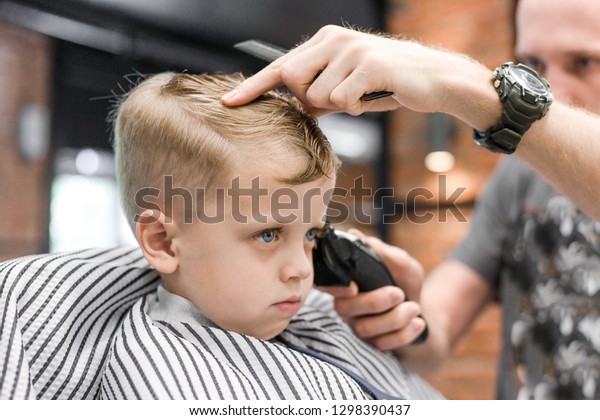 Hairdresser Cuts Hair Little Boy Blonde Stock Photo Edit