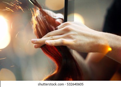 Hairdresser Cutting And Modeling Brown Hair By Scissors And Comb

