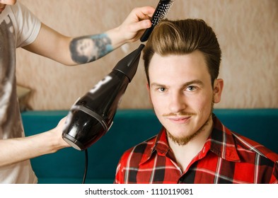 Hairdresser Does Hair Styling Pompadour To A Young Man