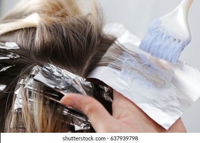 Hairdresser Is Dying Female Hair. Hair Dying Coloring Foil 