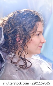 Hairdresser Hands Drying Hair With Towel To Client After Washing.  Hairdresser Doing A Perm Rolling The Hair For A Wavy Effect Or Curly Hair. Woman Making Curly Hair In A Beauty Salon. Shallow Depth 