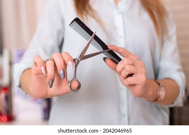 Hairdresser Hands Holding Scissors For Haircut And Brush In Hairdressing Salon