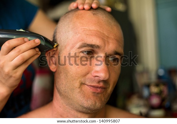 Hairdresser Makes Hairstyle Bald Man Stock Photo Edit Now 140995807