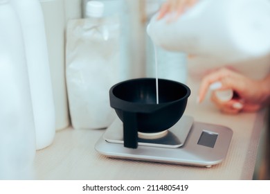 
Hairdresser Poring hair Dye Developer in Mixing Bowl on a Scale. Professional colorist measuring product before applying it to change color
 - Powered by Shutterstock